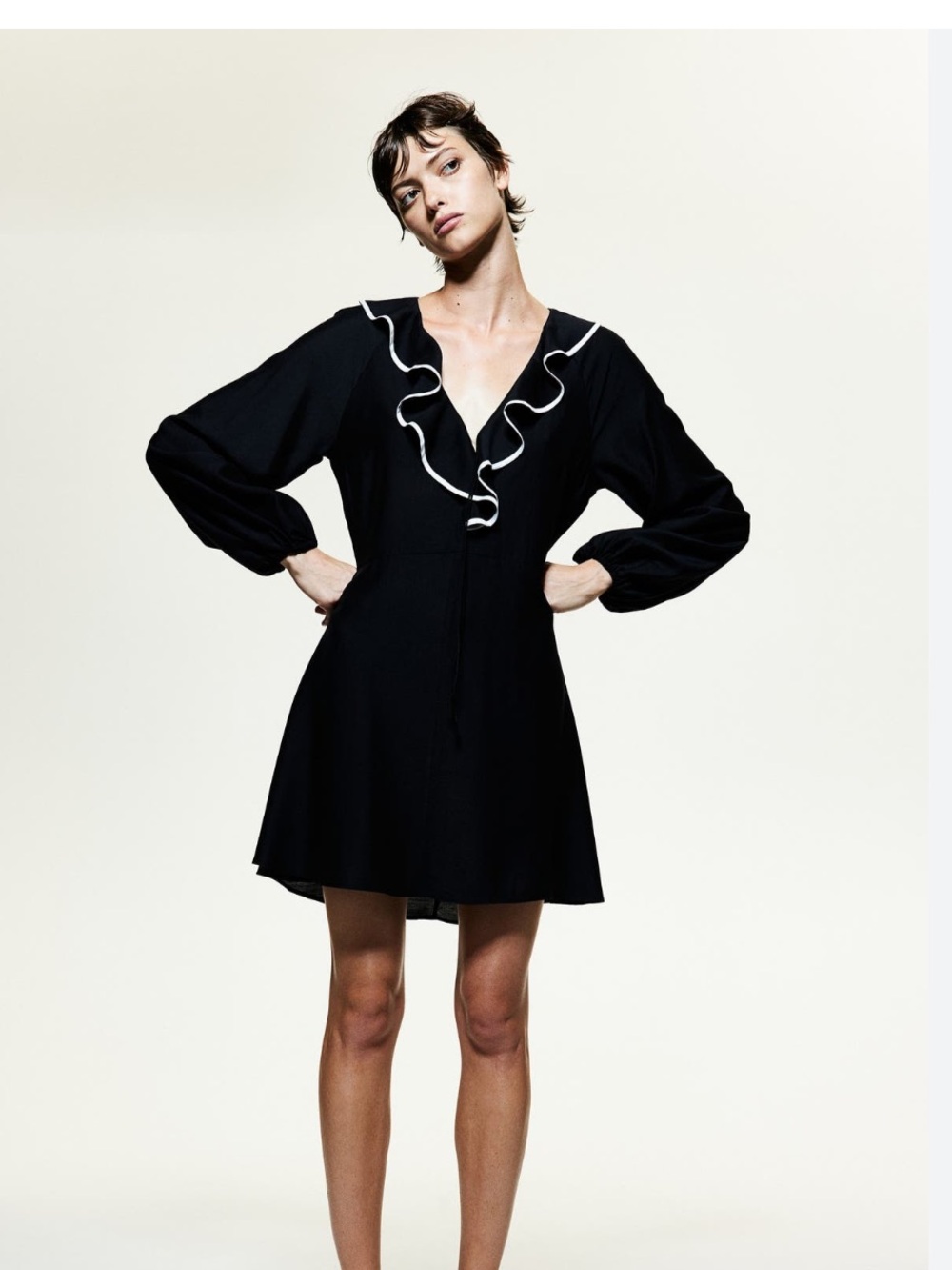 H&M Black Mini Dress with White Flounce Trim